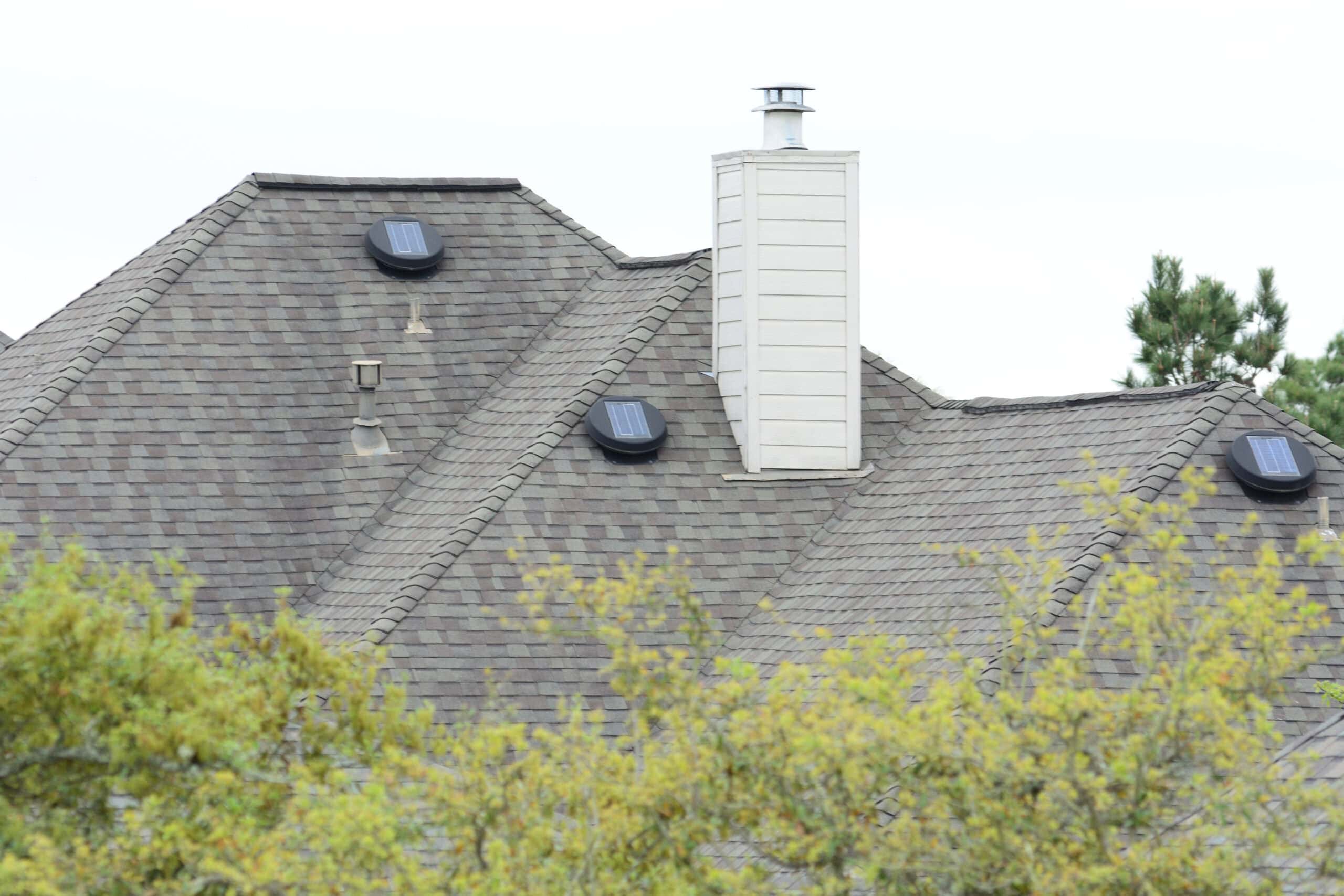 Solar powered attic vents on house